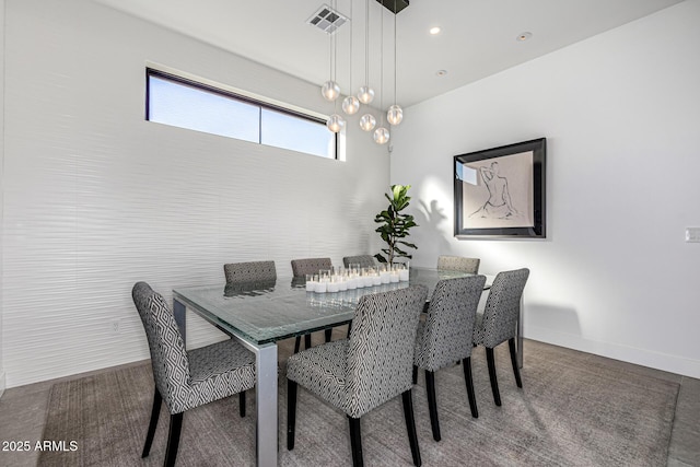 dining space featuring an inviting chandelier