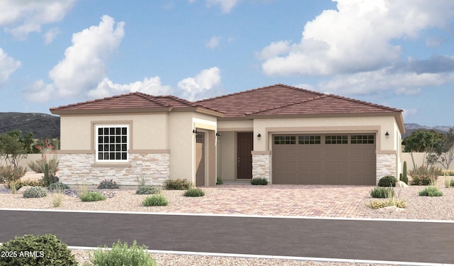 view of front of house featuring a garage and a mountain view