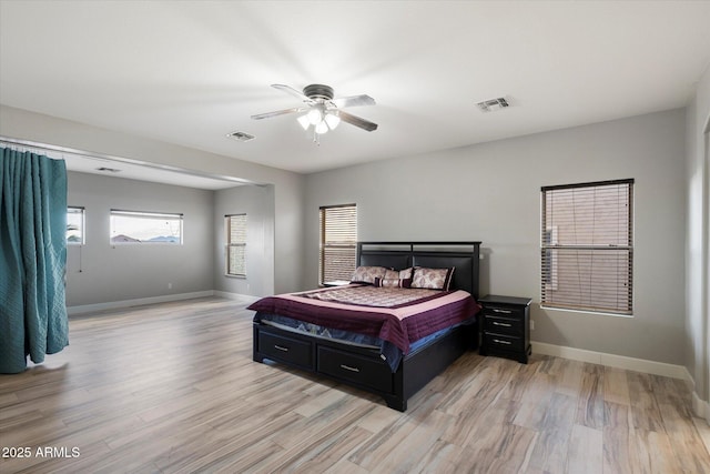 bedroom featuring ceiling fan and light wood-type flooring