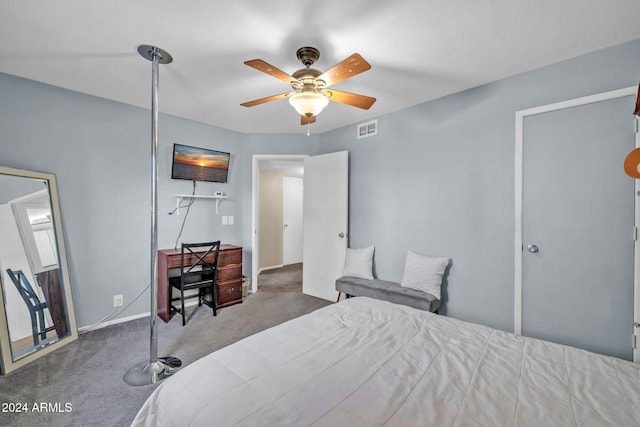 bedroom with ceiling fan and carpet floors