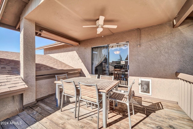 view of patio with ceiling fan and a deck