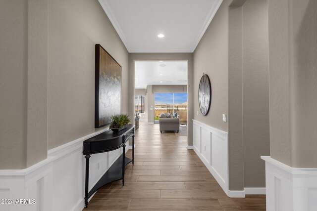 living room featuring crown molding and sink