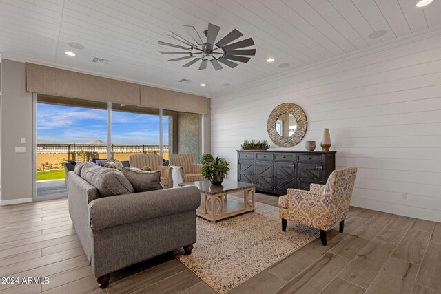 patio terrace at dusk with an outdoor hangout area and ceiling fan