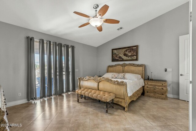 bedroom with access to exterior, ceiling fan, light tile patterned flooring, and lofted ceiling