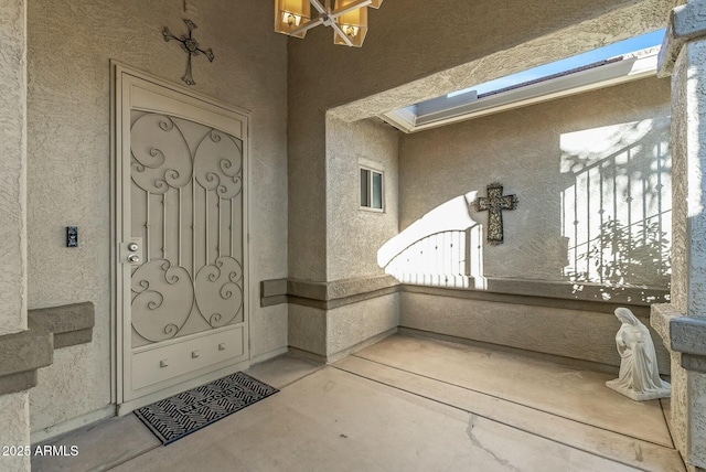 doorway to property featuring covered porch