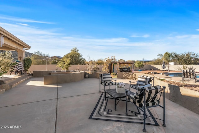 view of patio with a fenced in pool