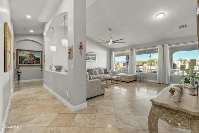 living room with ceiling fan