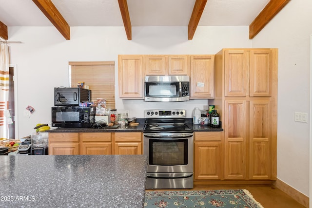 kitchen featuring stainless steel appliances, dark countertops, beam ceiling, and baseboards