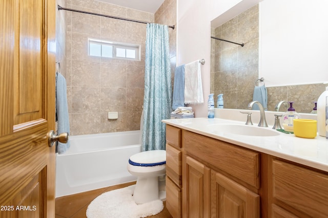 bathroom featuring tile patterned floors, vanity, toilet, and shower / bathtub combination with curtain