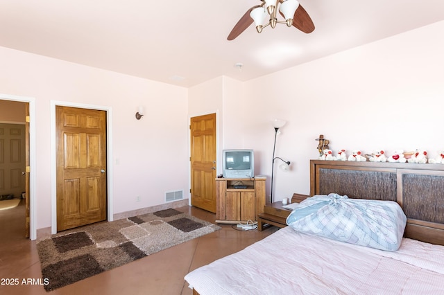 bedroom featuring ceiling fan and visible vents