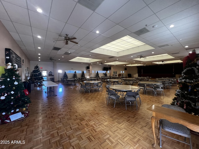 interior space featuring parquet flooring and ceiling fan