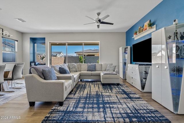 5725 S 101st St, Mesa, AZ 85212 - living room featuring a ceiling fan, wood finished floors, and visible vents