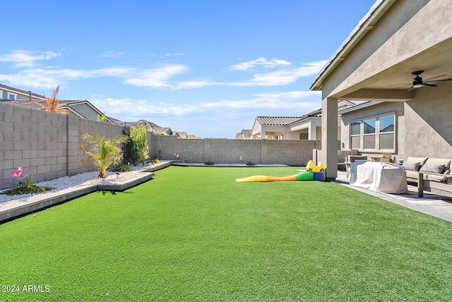 5725 S 101st St, Mesa, AZ 85212 - view of yard featuring an outdoor hangout area, a ceiling fan, and a fenced backyard