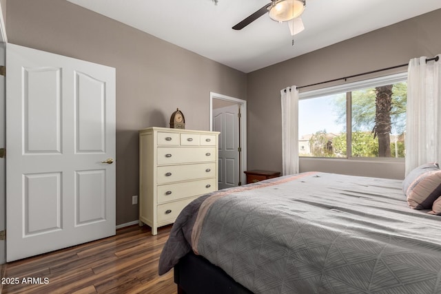 16626 E Westby Dr Unit 108, Fountain Hills, AZ 85268 - bedroom with dark wood-type flooring, ceiling fan, and baseboards