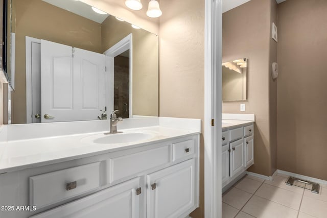 16626 E Westby Dr Unit 108, Fountain Hills, AZ 85268 - bathroom with vanity, tile patterned flooring, and baseboards