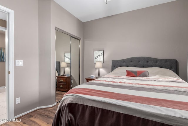 16626 E Westby Dr Unit 108, Fountain Hills, AZ 85268 - bedroom featuring wood finished floors, a closet, and baseboards