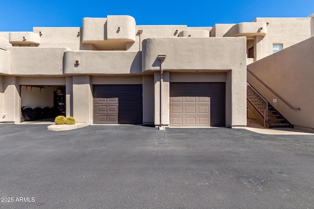 16626 E Westby Dr Unit 108, Fountain Hills, AZ 85268 - view of front of home featuring stucco siding and stairs