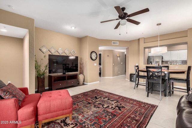 16626 E Westby Dr Unit 108, Fountain Hills, AZ 85268 - living area featuring ceiling fan, light tile patterned floors, and baseboards