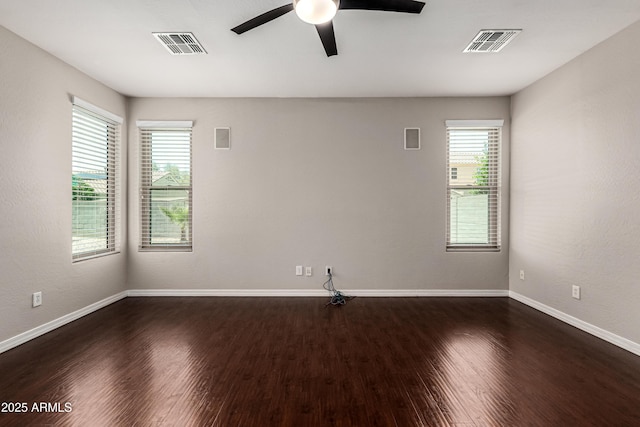 4322 S Ranger Trl, Gilbert, AZ 85297 - empty room with plenty of natural light, dark wood-style flooring, and ceiling fan