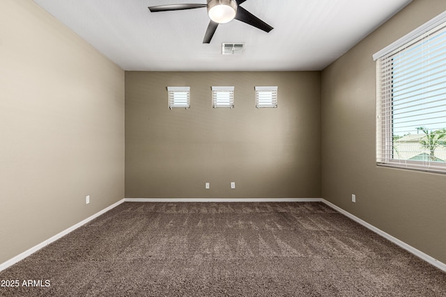 4322 S Ranger Trl, Gilbert, AZ 85297 - unfurnished room featuring ceiling fan, dark carpet, and plenty of natural light