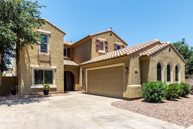 4322 S Ranger Trl, Gilbert, AZ 85297 - mediterranean / spanish house with a tile roof, an attached garage, stucco siding, and driveway