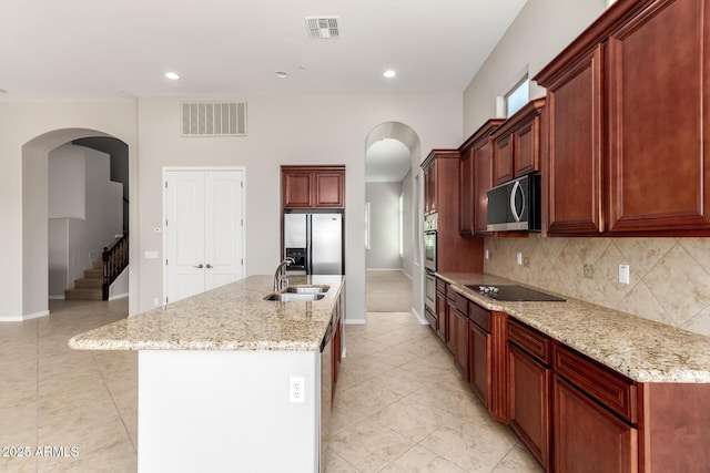 31604 N 19th Ave, Phoenix, AZ 85085 - kitchen with a sink, visible vents, arched walkways, and stainless steel appliances
