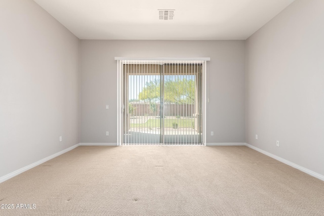 31604 N 19th Ave, Phoenix, AZ 85085 - spare room with light carpet, baseboards, and visible vents