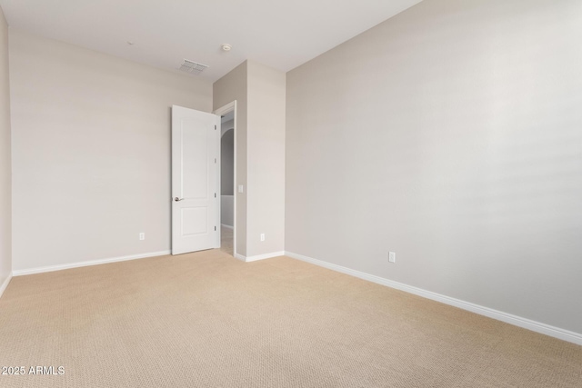 31604 N 19th Ave, Phoenix, AZ 85085 - spare room featuring visible vents, light colored carpet, and baseboards