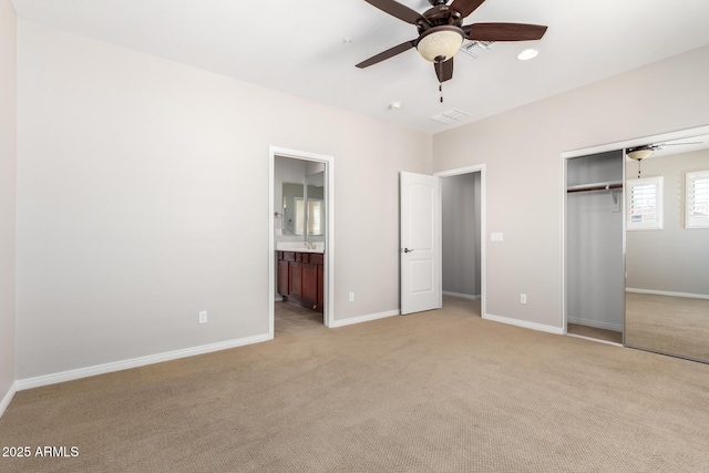 31604 N 19th Ave, Phoenix, AZ 85085 - unfurnished bedroom featuring a closet, baseboards, and light colored carpet