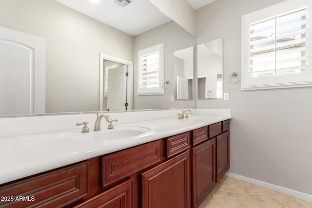 31604 N 19th Ave, Phoenix, AZ 85085 - full bath with a sink, visible vents, baseboards, and double vanity