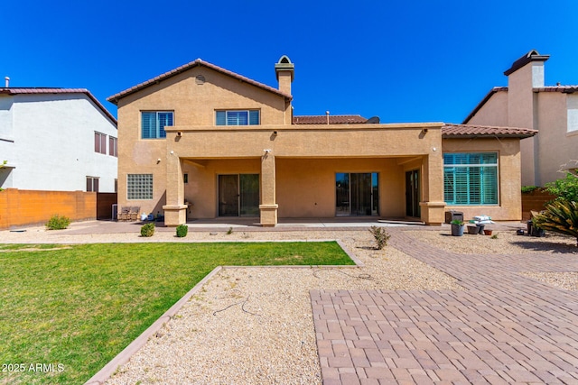 31604 N 19th Ave, Phoenix, AZ 85085 - rear view of property featuring a patio area, a chimney, a tile roof, fence, and stucco siding
