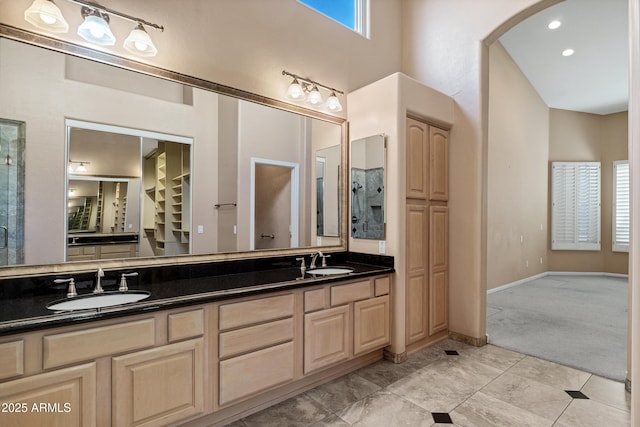 bathroom featuring vanity and tile patterned flooring