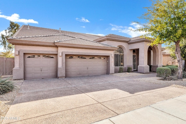 view of front of home with a garage