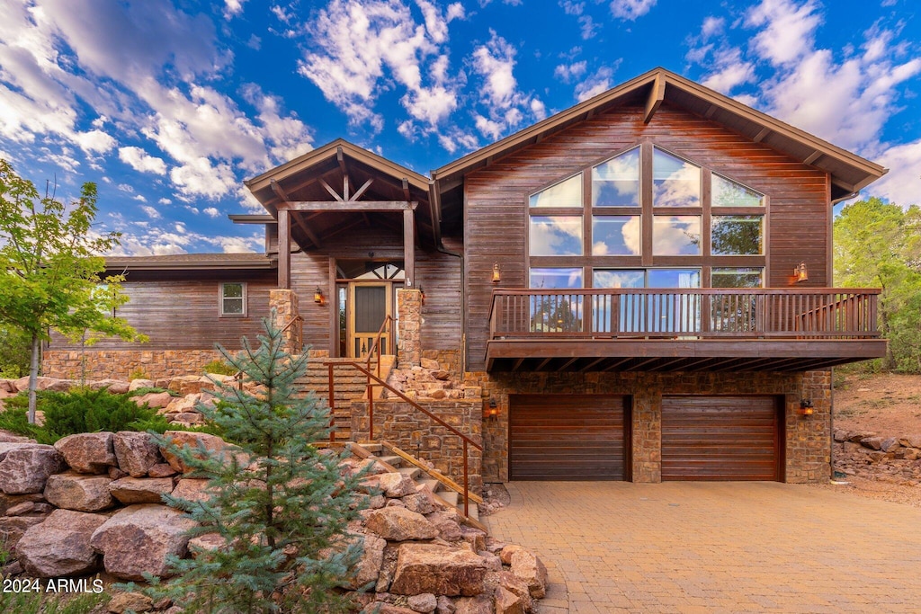 2000 E Yellowbell Ln, Payson, AZ 85541 - rustic home featuring a garage and decorative driveway