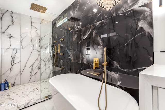 bathroom with tile walls, tile patterned floors, and independent shower and bath