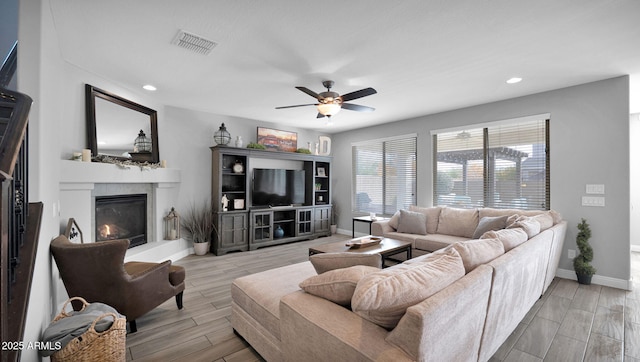 living room with ceiling fan