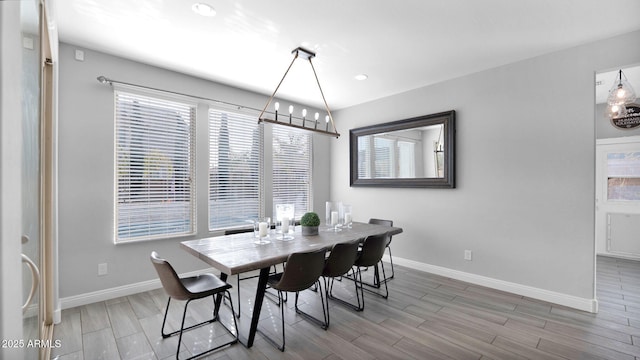 dining area with hardwood / wood-style floors