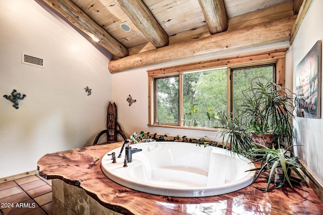 bathroom with visible vents, beam ceiling, a garden tub, tile patterned flooring, and wood ceiling