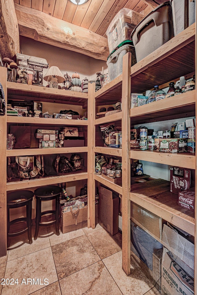 wine area with wood ceiling