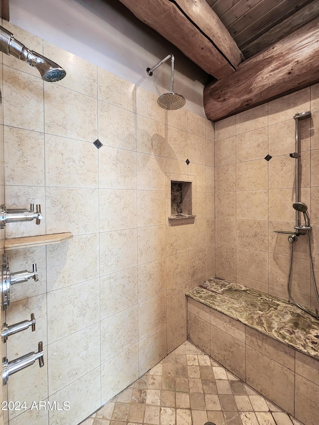 full bath featuring tiled shower