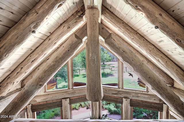 interior space featuring beam ceiling and wood ceiling