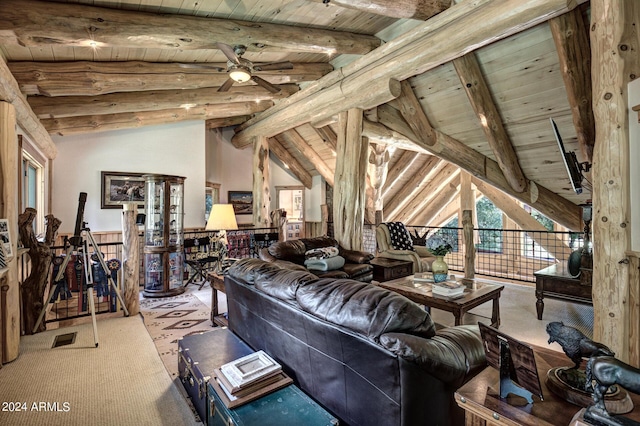 living area featuring visible vents, lofted ceiling with beams, carpet flooring, wooden ceiling, and a ceiling fan