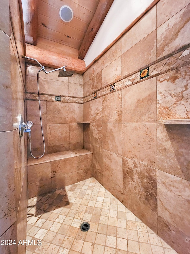 bathroom with tiled shower