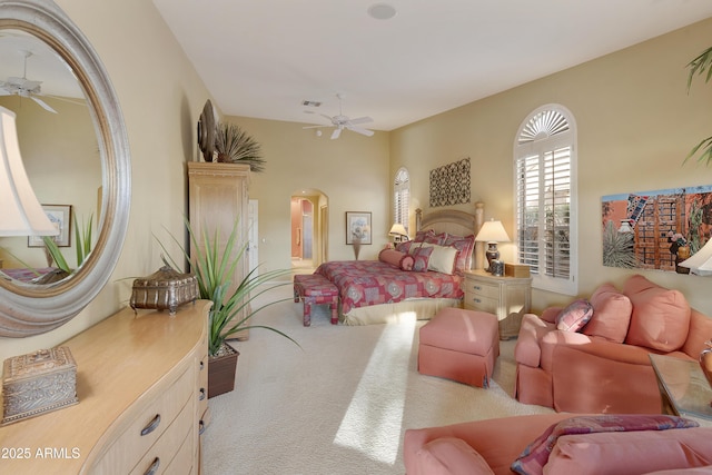 carpeted bedroom with ceiling fan