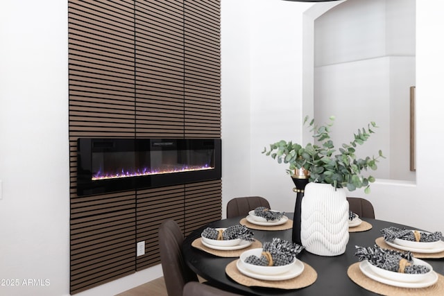 802 N Lisbon Dr, Chandler, AZ 85226 - dining space with a glass covered fireplace