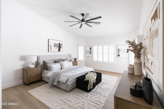 802 N Lisbon Dr, Chandler, AZ 85226 - bedroom with baseboards, light wood-style floors, lofted ceiling, and ceiling fan