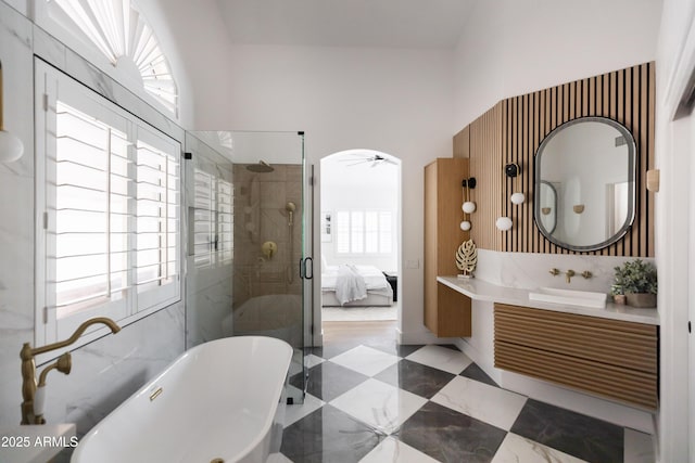 802 N Lisbon Dr, Chandler, AZ 85226 - ensuite bathroom featuring vanity, a freestanding tub, and a shower stall