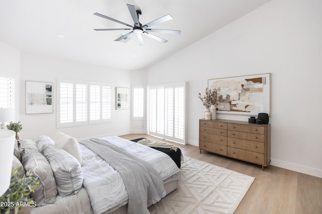 802 N Lisbon Dr, Chandler, AZ 85226 - bedroom with light wood-style flooring, vaulted ceiling, baseboards, and ceiling fan