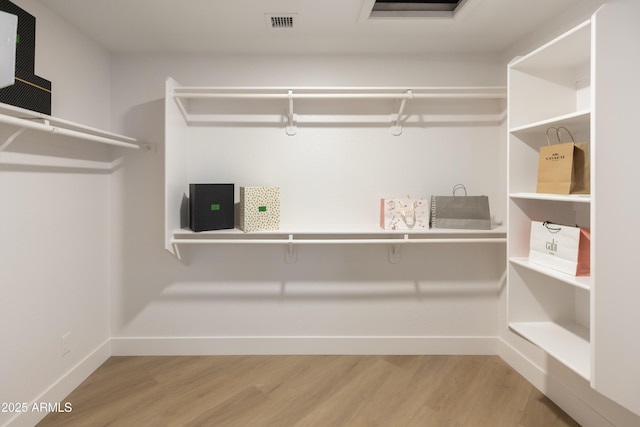 802 N Lisbon Dr, Chandler, AZ 85226 - walk in closet featuring wood finished floors