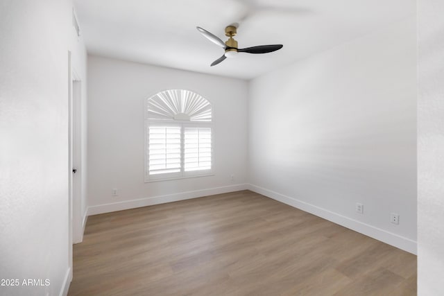 802 N Lisbon Dr, Chandler, AZ 85226 - spare room with a ceiling fan, baseboards, and wood finished floors